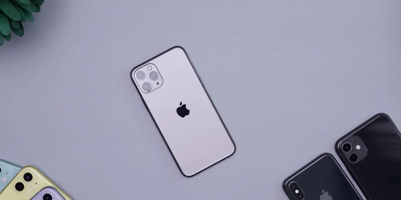 Image of a silver iPhone laying down among other iphones